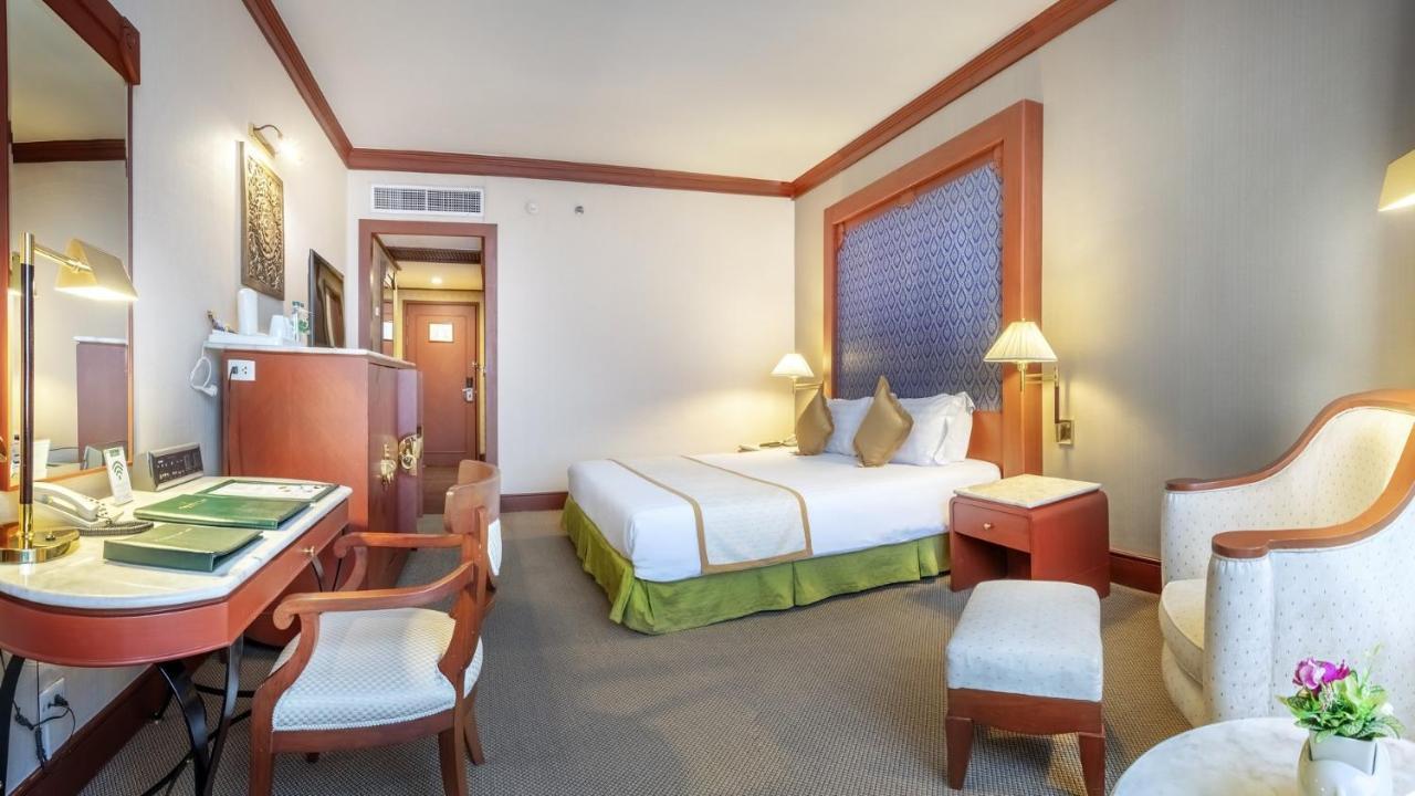 Отель Ramada By Wyndham Bangkok Chaophya Park Экстерьер фото